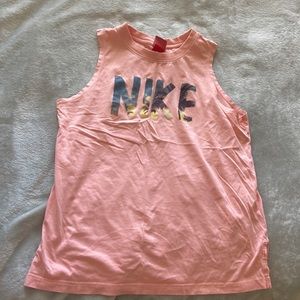 Nike pink tank top with palm tree design on lettering